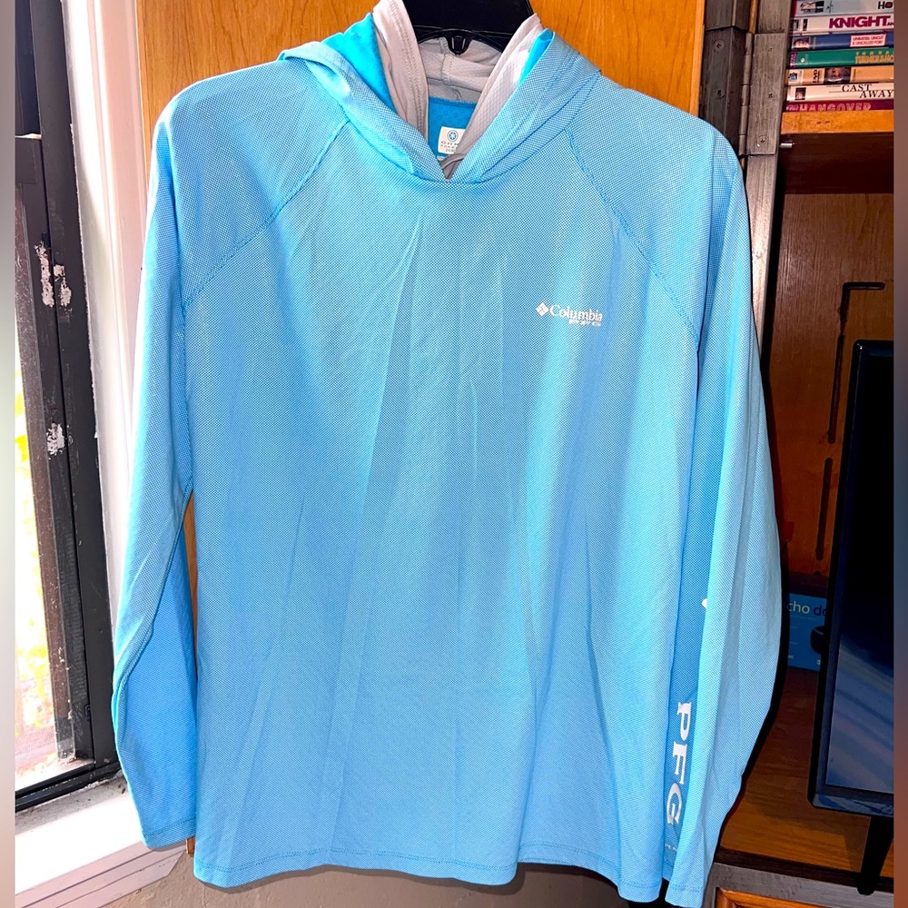 Long sleeve, Columbia brand, with hood and neck guard. Never worn.